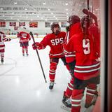 St. Paul's School Photo #13 - Girls Varsity hockey celebrating a goal against Exeter.