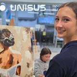 UNISUS School Photo #9 - In Fine Arts Enrichment, students explore a variety of mediums and learn painting techniques inspired by the masters. From creating the underpainting to capturing light, they discover how each layer brings their work to life. Students often display their art at a local gallery, giving them a chance to share what they've created with the wider community.